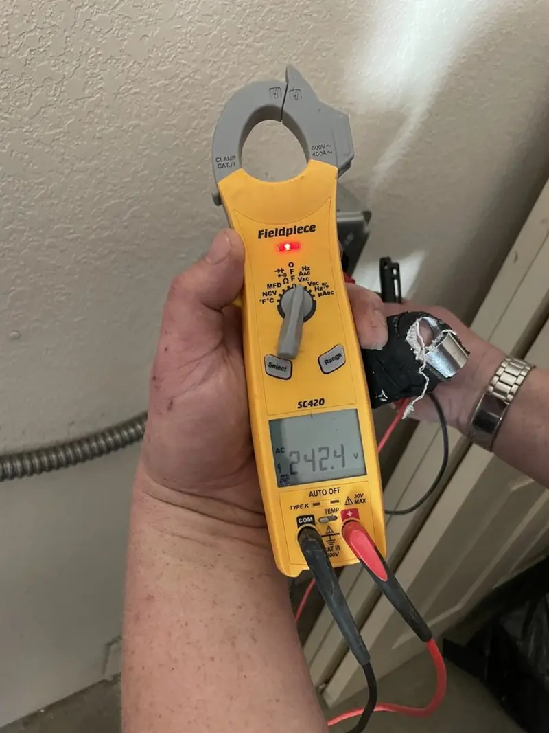 Voltage testing with clamp meter during Hot Tub / Pool Electrical Wiring in Hutchins